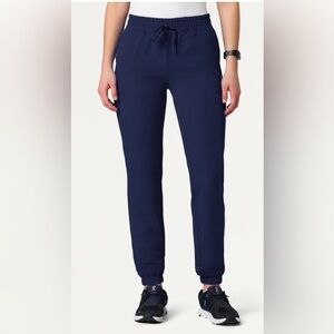 Like New- Jaanuu "Jace" SKINNY navy blue 7-pocket jogger scrubs (PETITE) - S